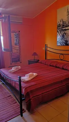 Letto o letti in una camera di Casa vacanze Stefania
