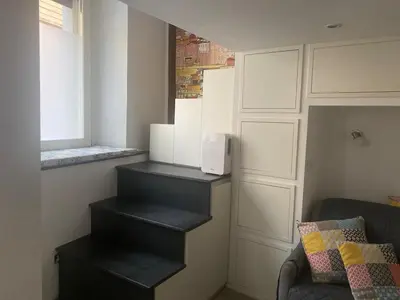 Area soggiorno di super central studio apartment