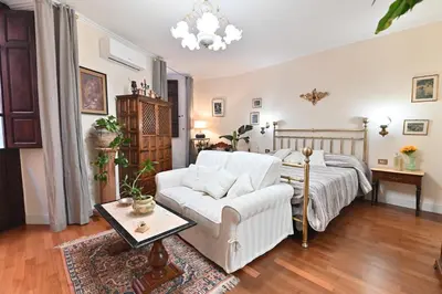 Letto o letti in una camera di casa vacanze edwige castello