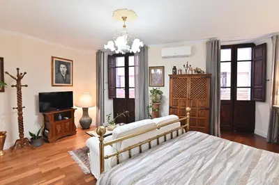 Letto o letti in una camera di casa vacanze edwige castello