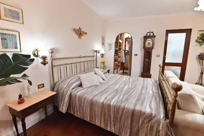 Letto o letti in una camera di casa vacanze edwige castello