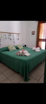 Letto o letti in una camera di Casa Giulia