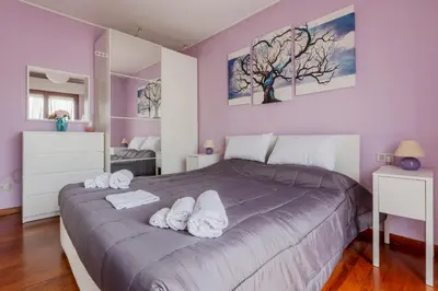 Letto o letti in una camera di GuestHost - Comfortable Terrace Apartment - Sestu
