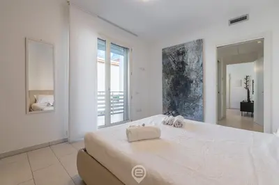 Letto o letti in una camera di Ada Bright Escape Apartment