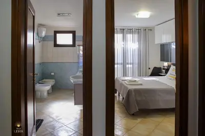 Letto o letti in una camera di Villa Libra