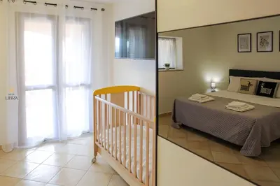Letto o letti in una camera di Villa Libra