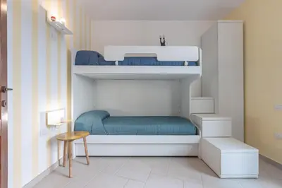 Letto o letti in una camera di GuestHost - Domus Ritae