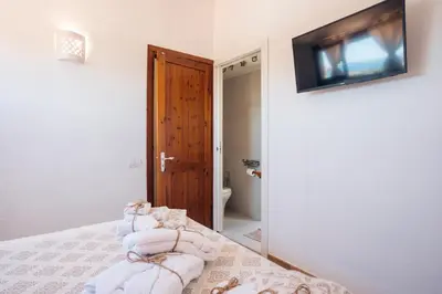 Letto o letti in una camera di Dimora Su Tramonti a due passi dal mare!