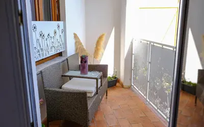 Area soggiorno di Just Rooms