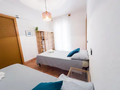 Letto o letti in una camera di Sa Marina Beach House