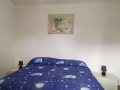 Letto o letti in una camera di Domino 12