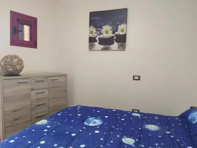 Letto o letti in una camera di Domino 12