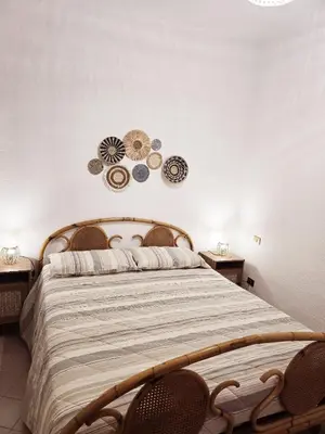 Letto o letti in una camera di Augusto's House