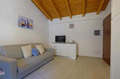 TV o dispositivi per l'intrattenimento presso Dimora blù al centro by Teuladaapartments
