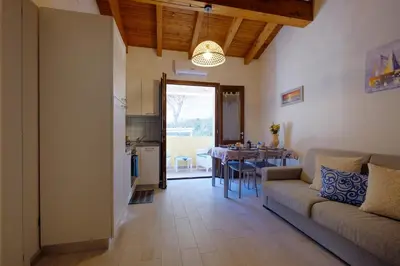 Area soggiorno di Dimora blù al centro by Teuladaapartments