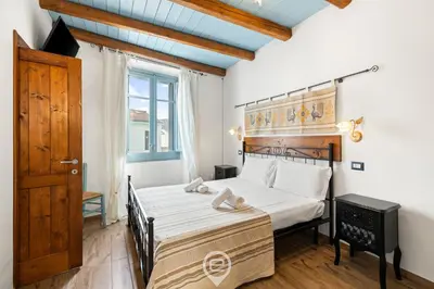 Letto o letti in una camera di Albachiara