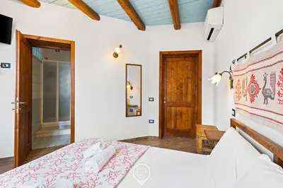 Letto o letti in una camera di Albachiara