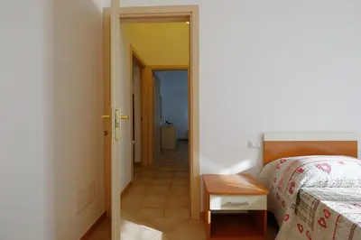 Letto o letti in una camera di Il giardino di Elisa by Teuladaapartments