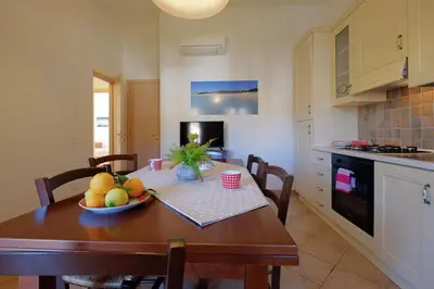 Cucina o angolo cottura di Il giardino di Elisa by Teuladaapartments