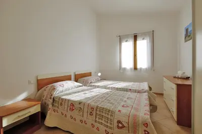 Letto o letti in una camera di Il giardino di Elisa by Teuladaapartments
