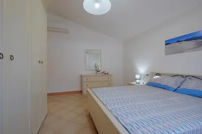 Letto o letti in una camera di Il giardino di Elisa by Teuladaapartments