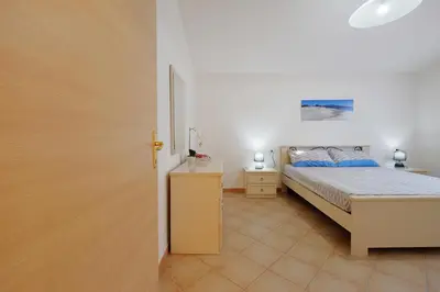 Letto o letti in una camera di Il giardino di Elisa by Teuladaapartments