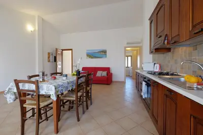 Cucina o angolo cottura di Il giardino di Marina by Teuladaapartments
