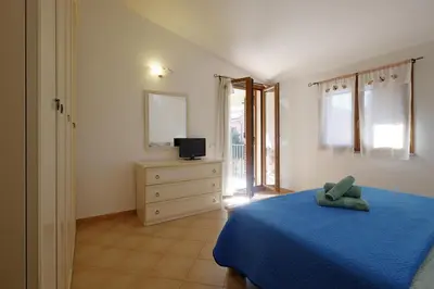 Letto o letti in una camera di Il giardino di Marina by Teuladaapartments