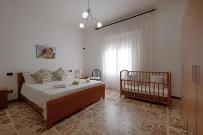 Letto o letti in una camera di Sguardi Teuladesi by Teuladaapartments