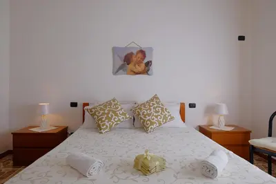 Letto o letti in una camera di Sguardi Teuladesi by Teuladaapartments
