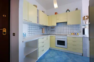 Cucina o angolo cottura di Rosy terrazza sul mare by Teuladaapartments