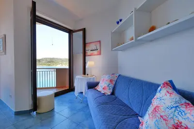 Area soggiorno di Rosy terrazza sul mare by Teuladaapartments