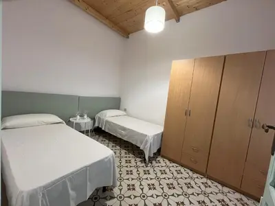 Letto o letti in una camera di A Casa di Carla