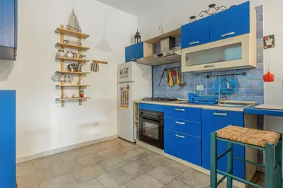 Cucina o angolo cottura di GuestHost Bright Apartment with private parking