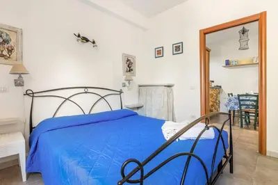 Letto o letti in una camera di GuestHost Bright Apartment with private parking
