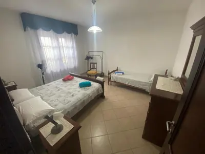 Letto o letti in una camera di Il Nuraghe
