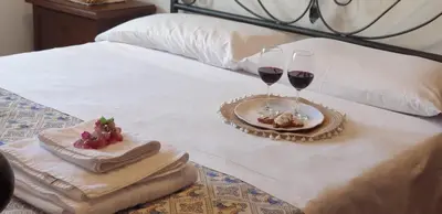 Letto o letti in una camera di Cantina Marongiu