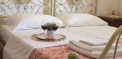Letto o letti in una camera di Cantina Marongiu