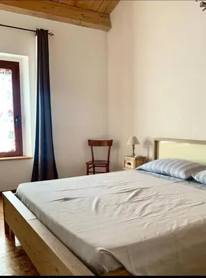 Letto o letti in una camera di Casa Vacanze SA PRATZA