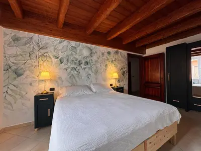 Letto o letti in una camera di Macrù Apartments