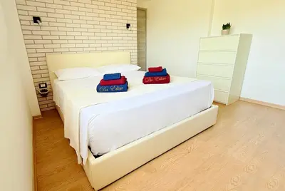 Letto o letti in una camera di Da Elisa MareSol