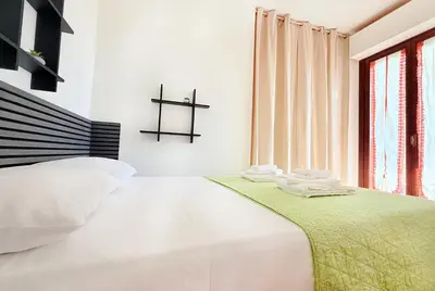 Letto o letti in una camera di Da Elisa MareSol