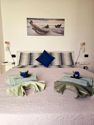 Letto o letti in una camera di Beatrice Holiday Homes