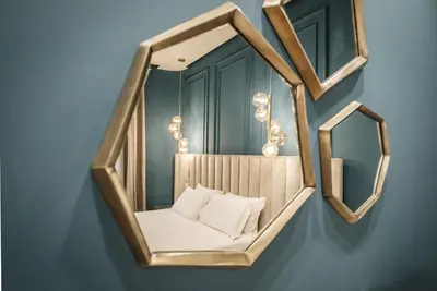 Letto o letti in una camera di Luxury Suites in the Heart of Cagliari