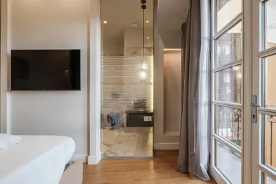 TV o dispositivi per l'intrattenimento presso Luxury Suites in the Heart of Cagliari