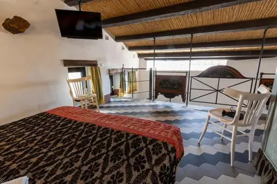 Letto o letti in una camera di Le Cementine