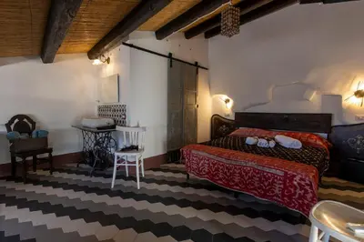 Letto o letti in una camera di Le Cementine