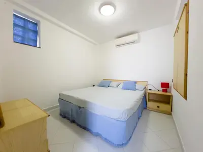 Letto o letti in una camera di A due passi dal mare
