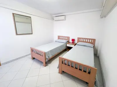 Letto o letti in una camera di A due passi dal mare