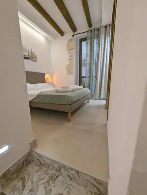 Letto o letti in una camera di Casa di Leda 3
